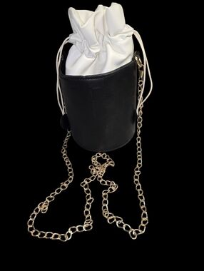 Women’s Black & White Drawstring Bucket Bag with Gold Chain